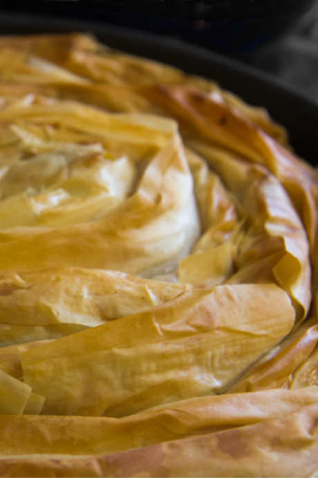 King Cake: Bulgarian king cake is called banitsa, and it’s made of phyllo dough. Banitsa is filled with cheese, along with good luck charms and paper fortunes.