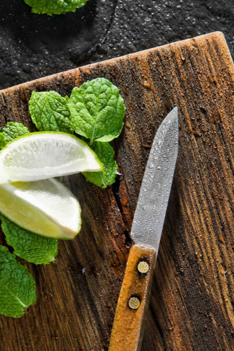 Essential Bar Tools: A bar board will help keep your kitchen counter clean and protected; you can whisk it away once you’re finished mixing.