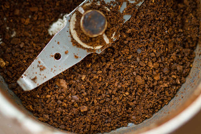 There are two types of coffee grinders: blade grinders and burr grinders. A blade grinder works just like it sounds, by chopping up coffee beans with a moving blade. The drawbacks of a blade grinder are the heat generated by the spinning blade and the inconsistent shape and size of the ground coffee.
