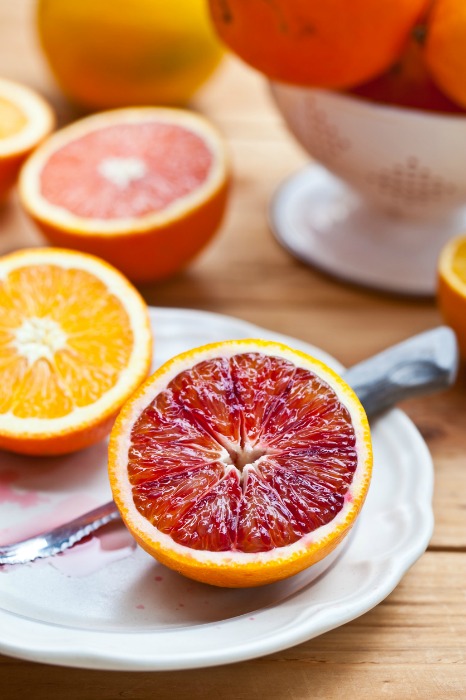 Blood oranges have a thinner peel and a redder hue than navel oranges, both inside and out. Blood oranges also have more Vitamin C than navel oranges.