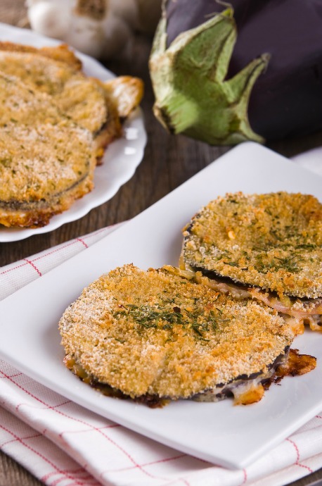 You can use any size eggplants for breaded eggplant cutlets, but smaller eggplants will give you more crispy coating on each slice. To make sure they stay crispy, toss the slices with a dash of salt and drain in a colander for 30 minutes.