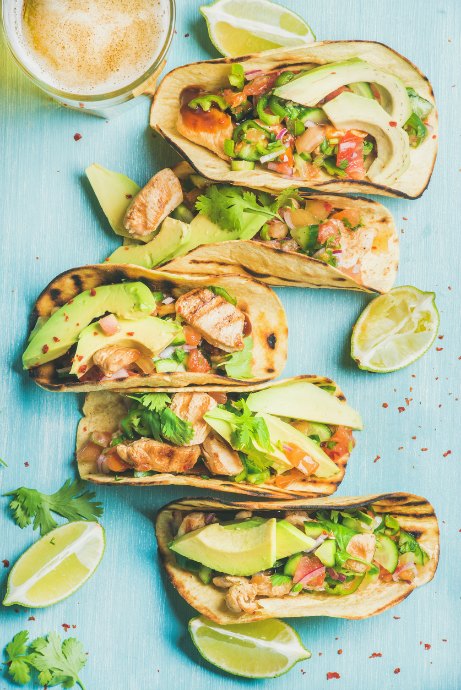 Grilled chicken, sliced avocado, and fresh cilantro all go perfectly in tacos