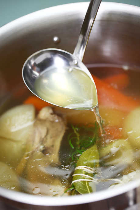 Homemade Chicken Stock: Keep your stock at a gentle simmer, not a rolling boil, and resist the urge to mix up the ingredients.