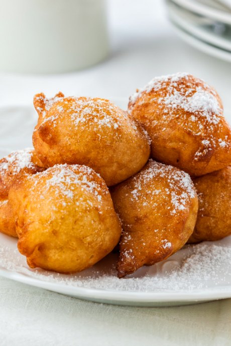 Coconut Recipes: Use a Dutch oven for frying coconut banana fritters, and a spring release scoop to drop batter into the oil.