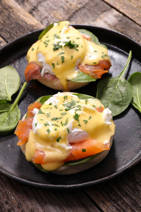 Hollandaise Sauce: Eggs Benedict is a classic breakfast dish featuring poached eggs topped with Hollandaise sauce.