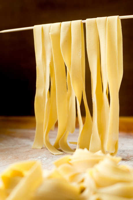Fettuccine is another pasta noodle that’s nearly synonymous with a dish: fettuccine Alfredo. Fettuccine is flat like linguine, but even wider.