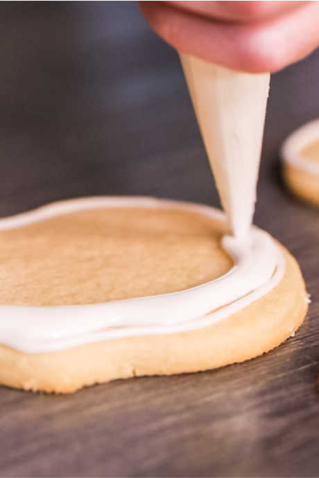 Cookie Decorating: Is your royal icing the right consistency for decorating? You want it to be thin enough that it floods properly, but thick enough to stay in place after you’ve piped it.