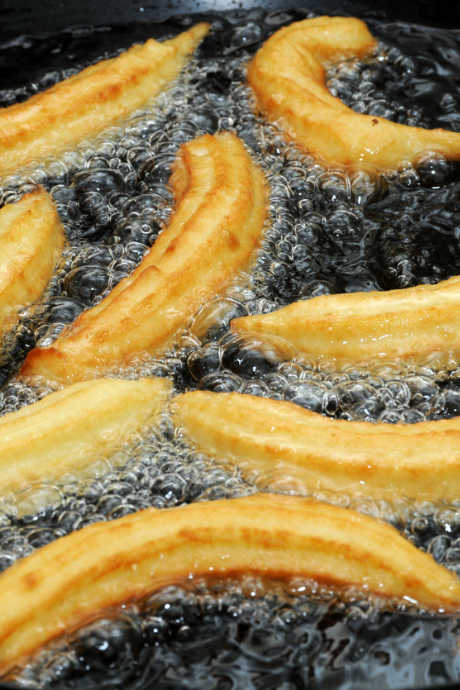 Churro Recipes: You can pipe the dough directly into the oil and snip the end of each churro with kitchen shears, or you can pipe all your churros onto parchment paper or a silicone baking mat and transfer them a few at a time.