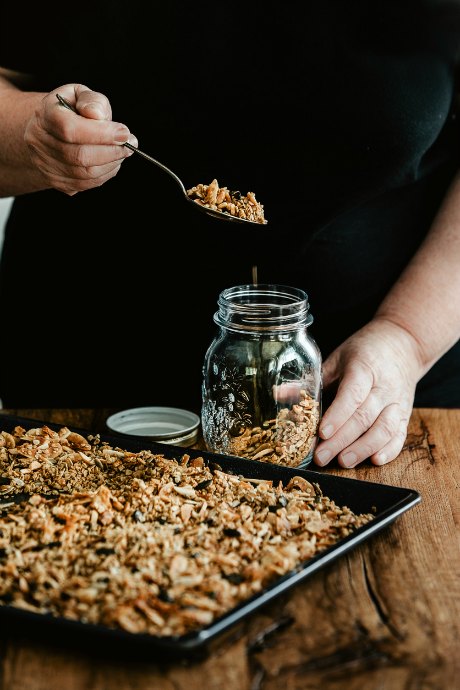 Homemade Granola: After you’ve mixed your wet ingredients into your dry ingredients so that everything is evenly coated, it’s time to bake your granola. Take the granola out of the oven before it looks and smells completely done.