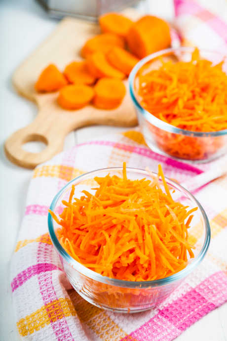 Grate or shred the carrots yourself; don’t rely on bagged pre-shredded carrots. The bagged variety aren’t as fresh and moist, and the texture of your cake will suffer.