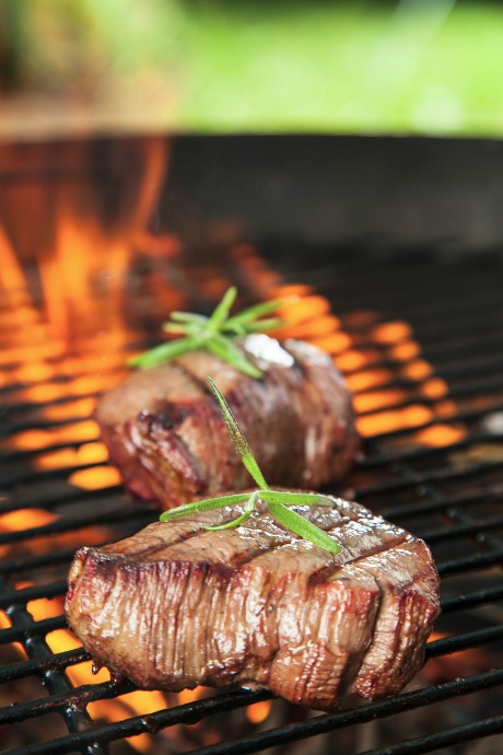 Dry heat cooks meat by transferring heat through air or oil. Dry heat cooking methods include grilling, baking, frying in oil, or broiling.