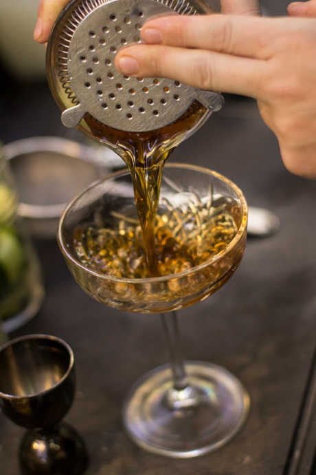 Essential Bar Tools: A Hawthorne strainer fits a Boston shaker, so it’s ideal for straining muddled fruit or herbs and chunks of ice out of shaken drinks. You’ll recognize a Hawthorne strainer, even if you’ve never used one yourself.