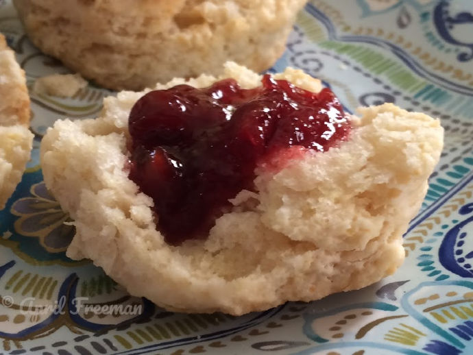 Homemade biscuits served with strawberry jam