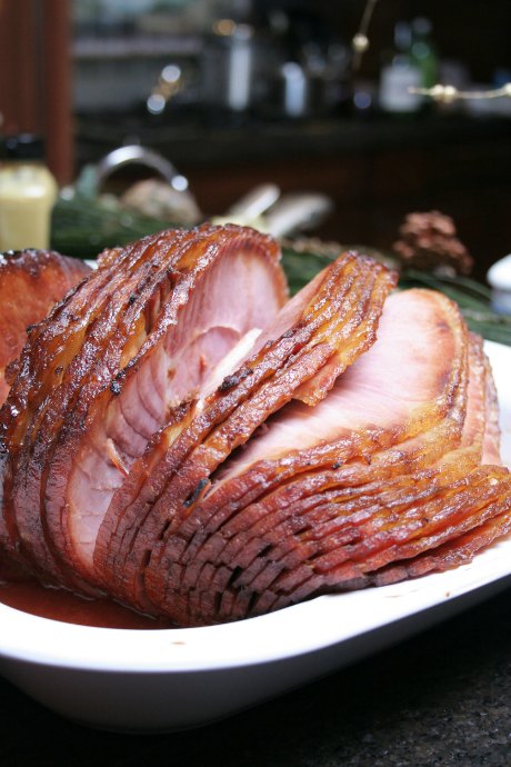 Ham refers to the hind leg of a pig. A whole ham extends from hip to ankle. That's probably more meat than you need. Buy a whole ham if you're hosting everyone on both sides of your family. Otherwise, a half ham will do.