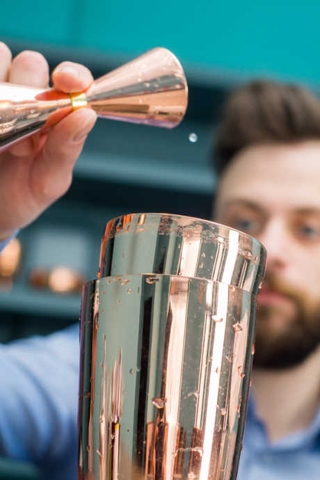 Essential Bar Tools: A jigger is simply a measuring cup especially for the bar. Jiggers come in a variety of measurements in half-ounce increments.