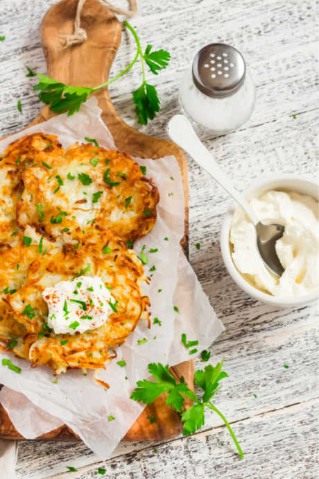 Latkes are usually topped with applesauce or sour cream.