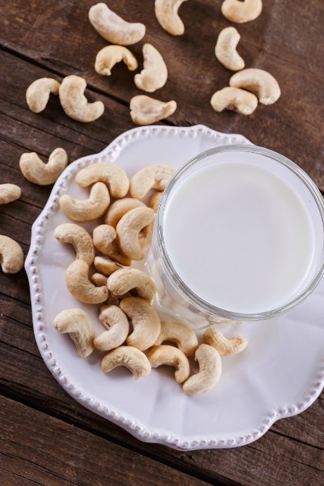 Soak the cashews in water for anywhere from half an hour to overnight. Then pop them into your blender or food processor and whirl until they turn smooth and creamy. The more water you add, the thinner and more pourable your cashew cream will be.