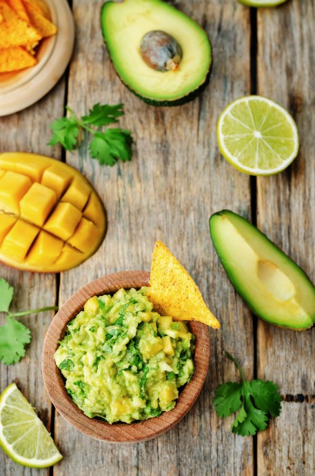 Mango is a delicious addition to guacamole -- give it a try!