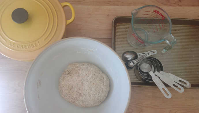 You can bake bread using what you probably already own: A medium to large mixing bowl, a baking sheet or Dutch oven (depending on the recipe), and measuring cups and spoons. No need to buy any fancy equipment.