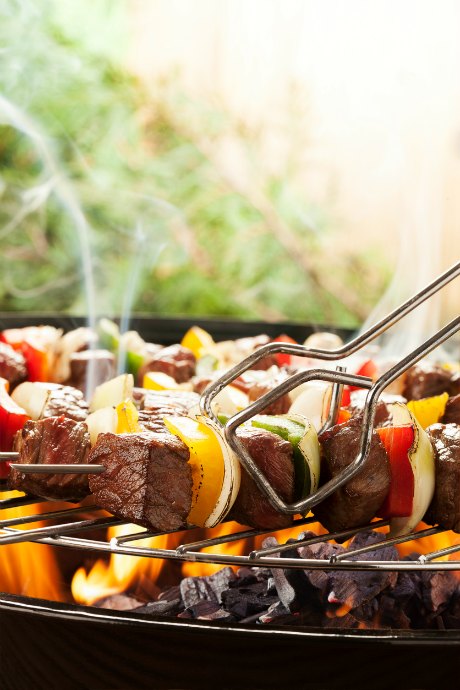Skewering ingredients separately helps with cooking time, but mixing them up will blend the flavors. The key seems to be keeping heartier foods on separate skewers from more delicate foods that cook faster.