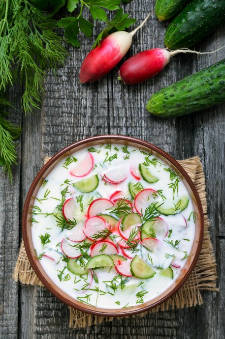 Cold Soups: Okrashka is a cold Russian soup that includes hard boiled eggs and boiled potatoes, along with radishes, cucumber, and fresh herbs.