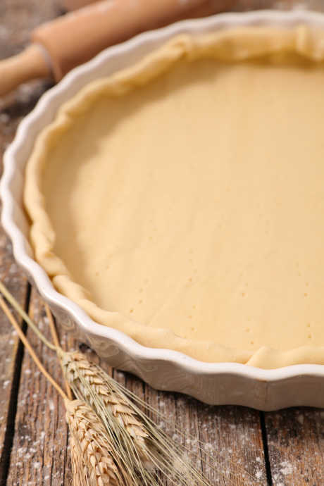 Blind Baking Pies: After you’ve mixed your dough and it’s come together in a ball with bits of fat scattered throughout, pop it into the refrigerator. Cold dough will roll out and take shape much better than room temperature dough.