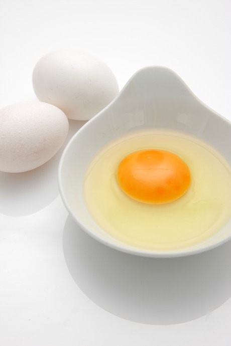 How to Poach Eggs: Don’t crack your eggs directly into the water. Instead, crack each one into a separate ramekin, saucer, or measuring cup. Doing so gives you more control when sliding your eggs into the simmering water.