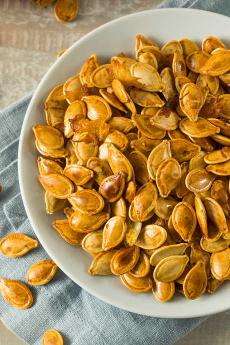 How to Roast Pumpkin Seeds: Gauge your seeds’ doneness by color: Let them keep roasting if they’re still white, but pop them out once they turn golden brown.