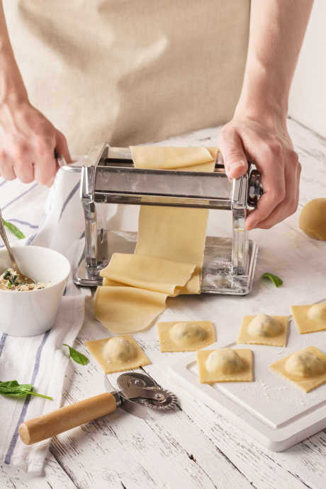 Ravioli Fillings: It’s important to roll your ravioli dough as thin as possible without it tearing or splitting once you add the filling. Keep rolling and folding and adjusting the settings of your pasta roller to get thinner and thinner sheets.