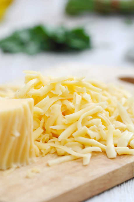 While scalloped potatoes technically don’t call for cheese, there aren’t many savory dishes that aren’t improved by a handful of cheese. Choose from the same sorts of cheeses you’d use in homemade macaroni and cheese.
