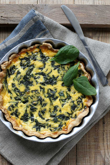 Spinach and Gruyere Quiche: Catherine de Medici gave the name "Florentine" to dishes containing spinach in honor of her Italian heritage. Combine spinach with heavy cream, Gruyere cheese, eggs, and spices for this quiche that's easier than it looks.