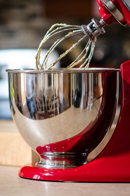 Stand Mixer vs. Hand Mixer: Stand mixers provide more power, allowing you to knead the heaviest bread doughs without ever getting flour on your hands. They also offer a wider variety of attachments, including wire whips, dough hooks, even ice cream makers and food processing attachments.