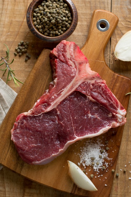 Cuts of Beef: A T-bone steak comes from the short loin primal cut. The distinctive T-shaped bone is part of the steer's vertebra.