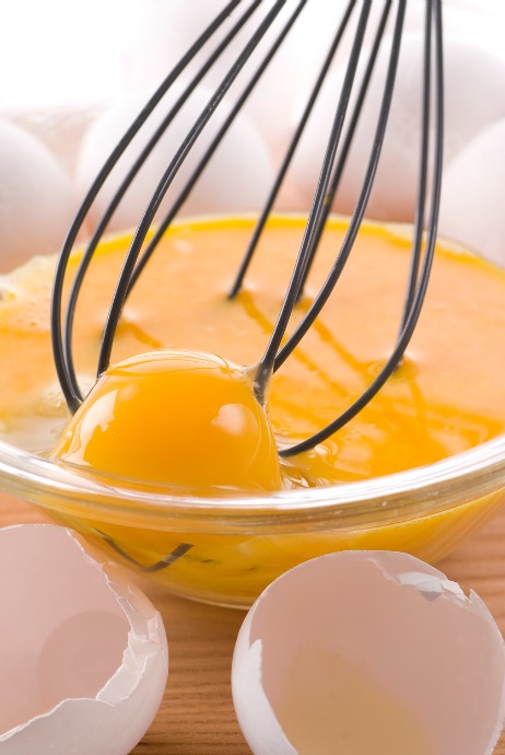 How to Temper Eggs: Crack your eggs into a separate bowl and separate the whites from the yolks. Set the whites aside for use in another recipe. Place the yolks in a heat-proof bowl and whisk them thoroughly.