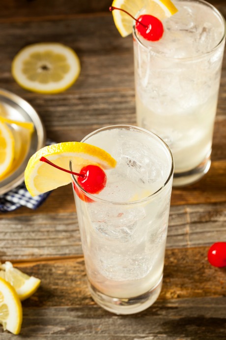 A Tom Collins is truly a classic, and it's perfect for summer. Mix gin, lemon juice, superfine sugar, and club soda, and pour it over a tall glass of ice.