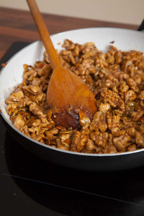 Candied Nuts: Stir nuts and sugar together in a skillet over low heat until the sugar melts and coats the nuts.