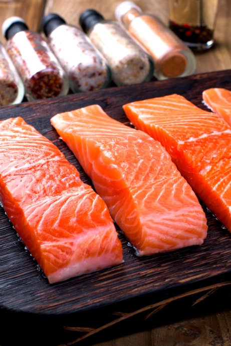 You can grill salmon with the skin or without it. Skin-on salmon will help hold the steak or fillet together as it cooks. If you choose skinless salmon, grill it on a greased sheet of foil.